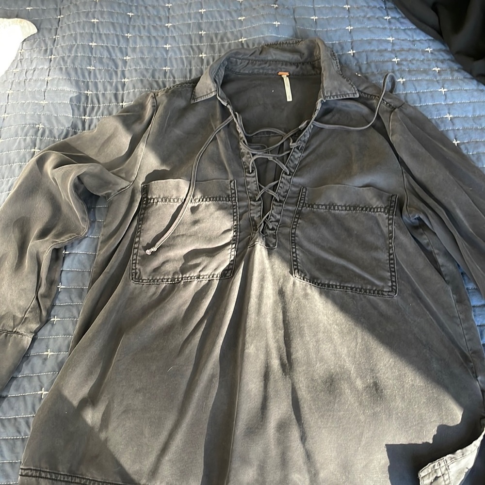 Free people tunic/blouse with ties. Size small, Charcoal gray color.